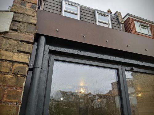 Raglan Rd Extension Corten steel fascia