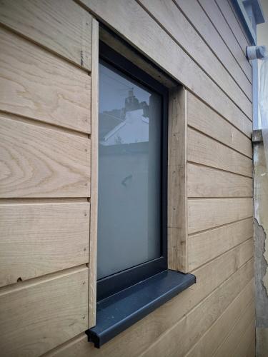 Raglan Rd Extension Window oak cladding