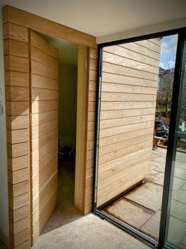 Raglan Rd extension Oak cladding WC door open